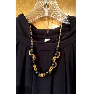 1184. Black and Gold Tone Serpentine Vintage Necklace